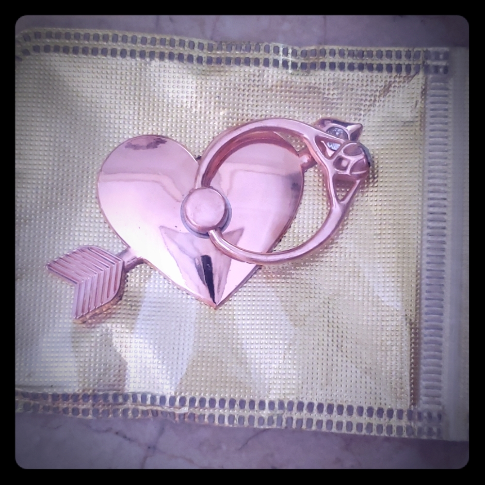 Ring holder/cell phone accessory